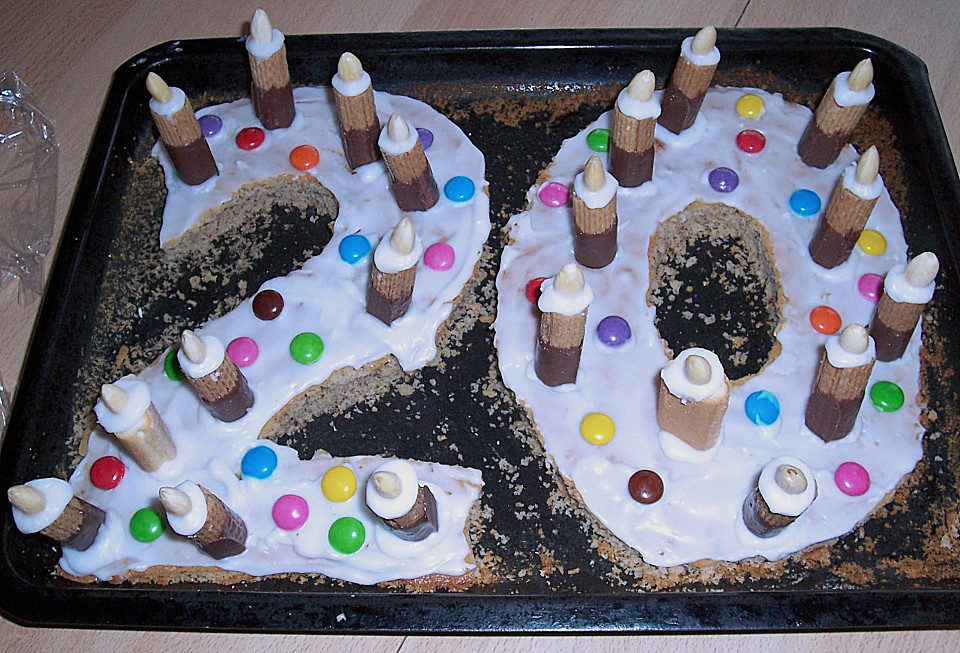 Bunter Geburtstagskuchen
 Bunter Geburtstagskuchen mit Waffelröllchen Mandel Kerzen