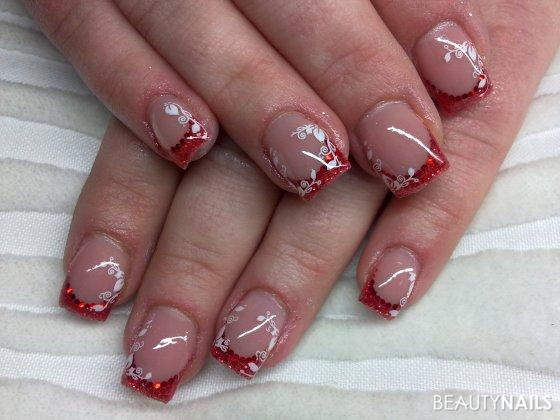 Jolifin Nageldesign
 glitzer rot mit kleinen pailletten Nageldesign