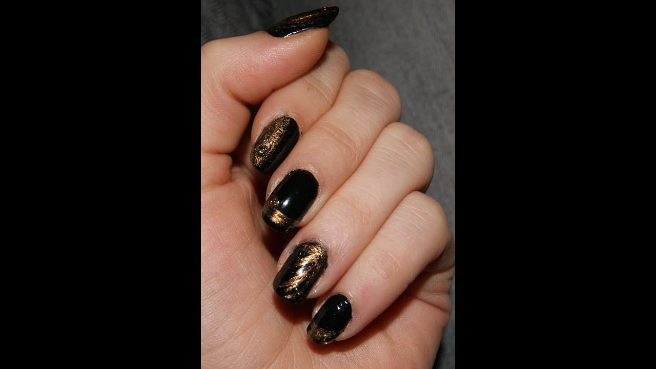 Nageldesign Gold
 SILVESTER Nageldesign Gold & Schwarz ★ JazZ MaNiiA