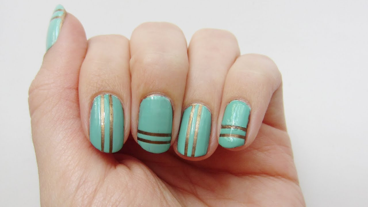 Nageldesign Youtube
 Nageldesign in mint mit goldenen Streifen