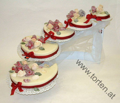 Hochzeitstorte Marzipan
 HOCHZEITSTORTE der KONDITOREI HANAUER