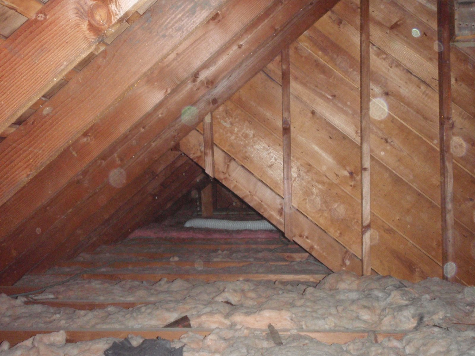 Joe's Garage
 Home Pride Contracting Installing Plywood In An Attic