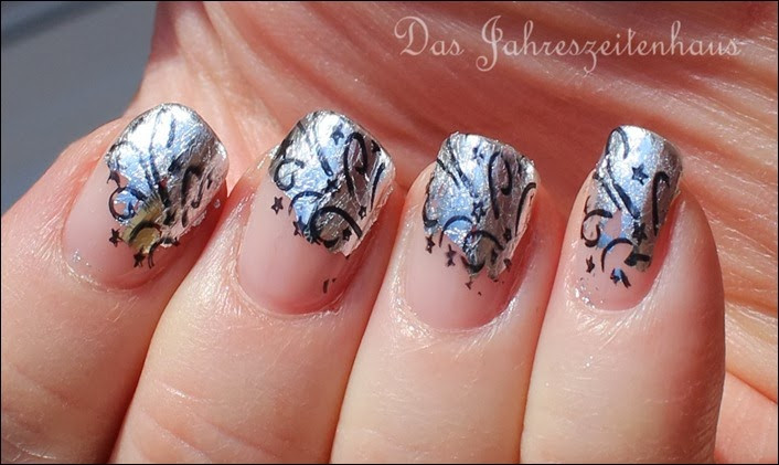 Nageldesign Silvester Glitzer
 Nageldesign Elegantes Silvester French mit Stamping