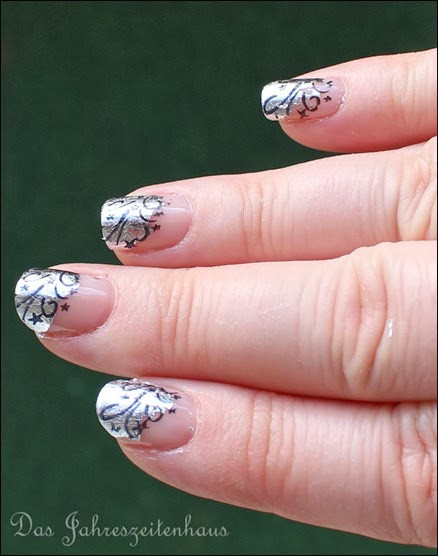 Nageldesign Silvester Glitzer
 Nageldesign Elegantes Silvester French mit Stamping