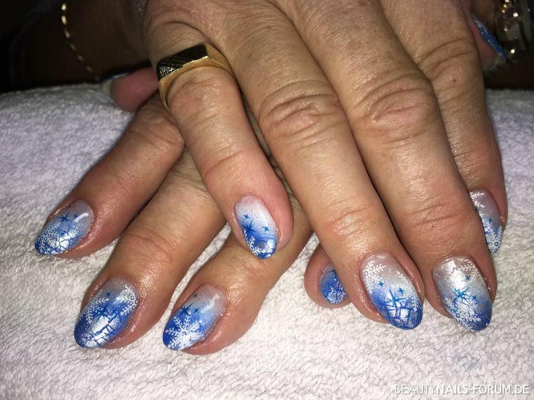 Nageldesign Winter Blau
 Wintermotiv Eis und Schnee in blau weiß Winter