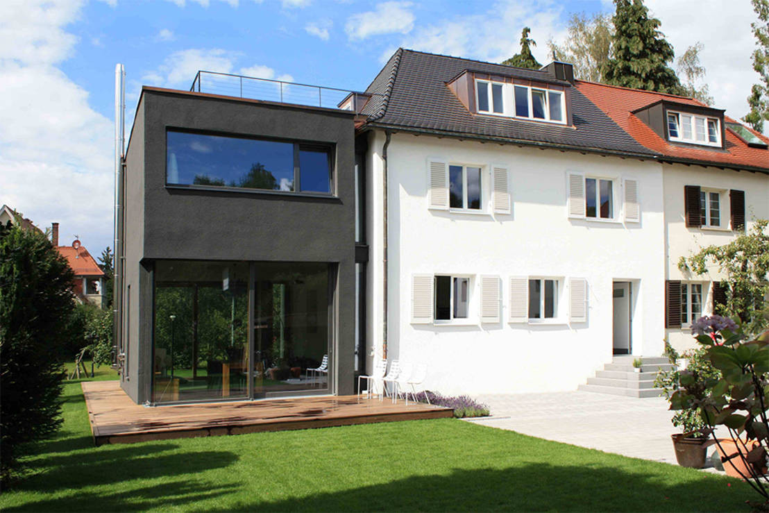 Anbau Haus
 Traditionelles Doppelhaus mit stylishem Anbau