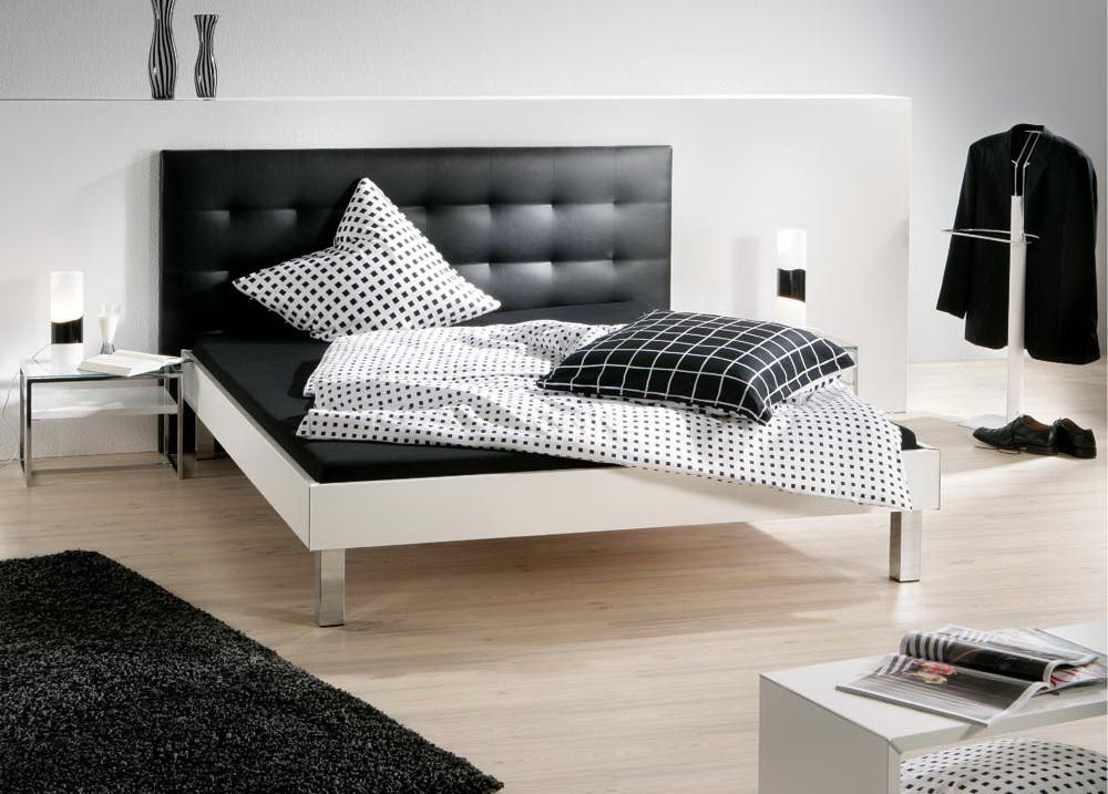 Bett 180
 Bett 180 x 200 cm weiß Kunstleder schwarz Kaufen bei