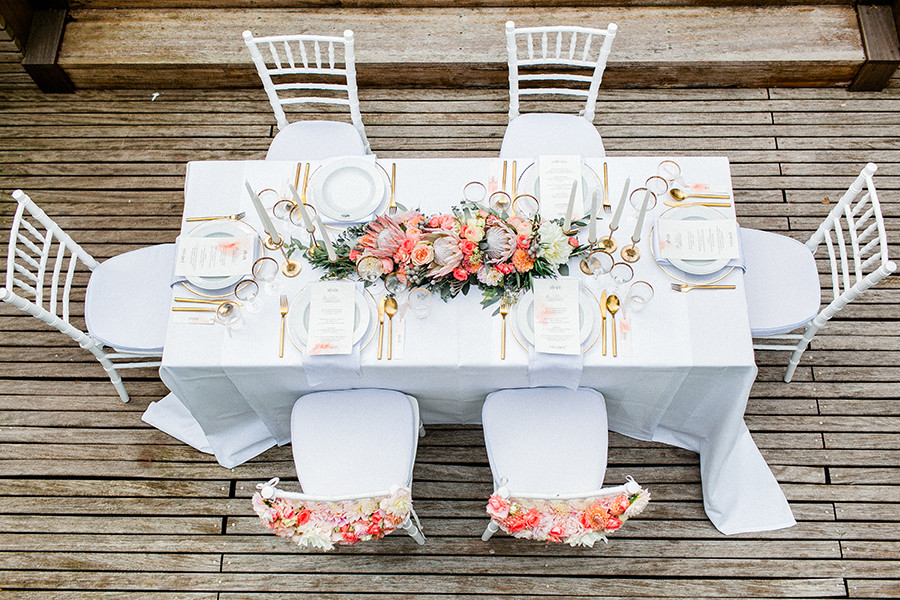 Blumengirlande Hochzeit
 Hochzeitsdeko in Koralle und Apricot