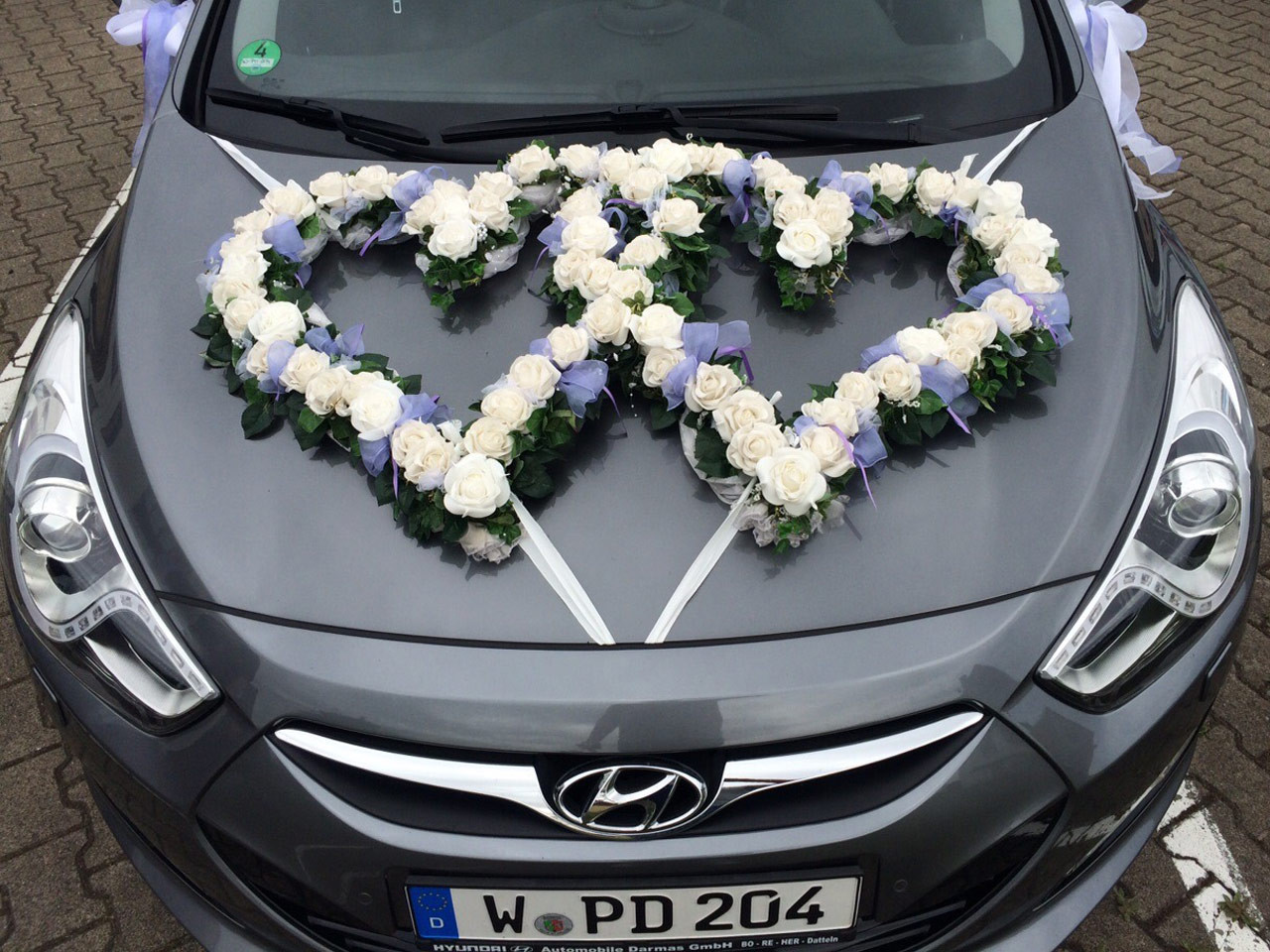 Blumenschmuck Auto Hochzeit
 Blumen Sanders Hochzeit Autodeko