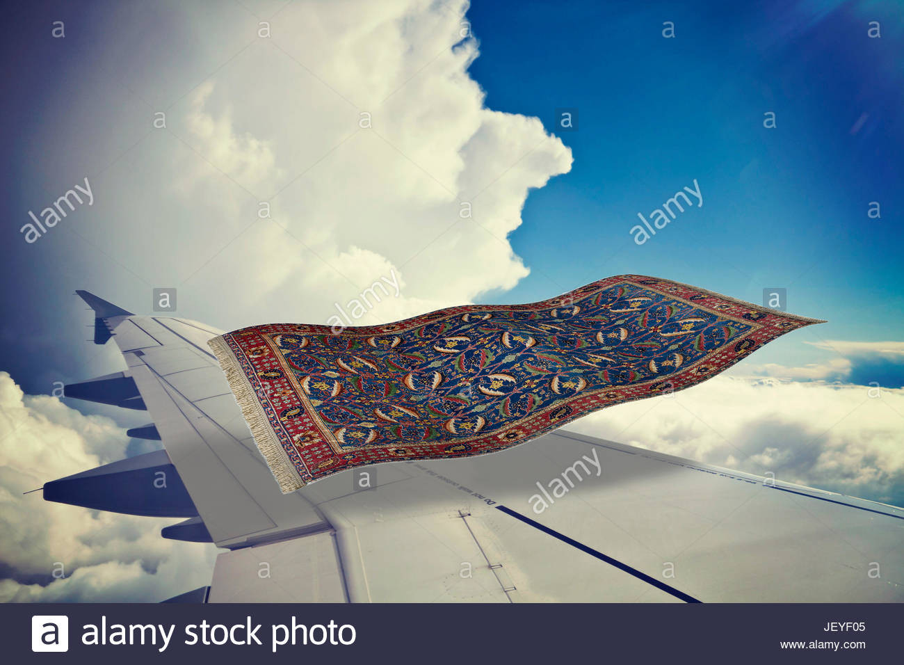Fliegender Teppich
 surrealistischer fliegender Teppich fliegt über ein