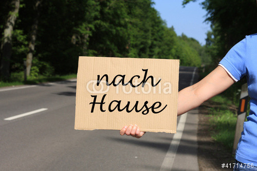 Nach Hause
 "Tramper mit Schild nach Hause" Stockfotos und lizenzfreie