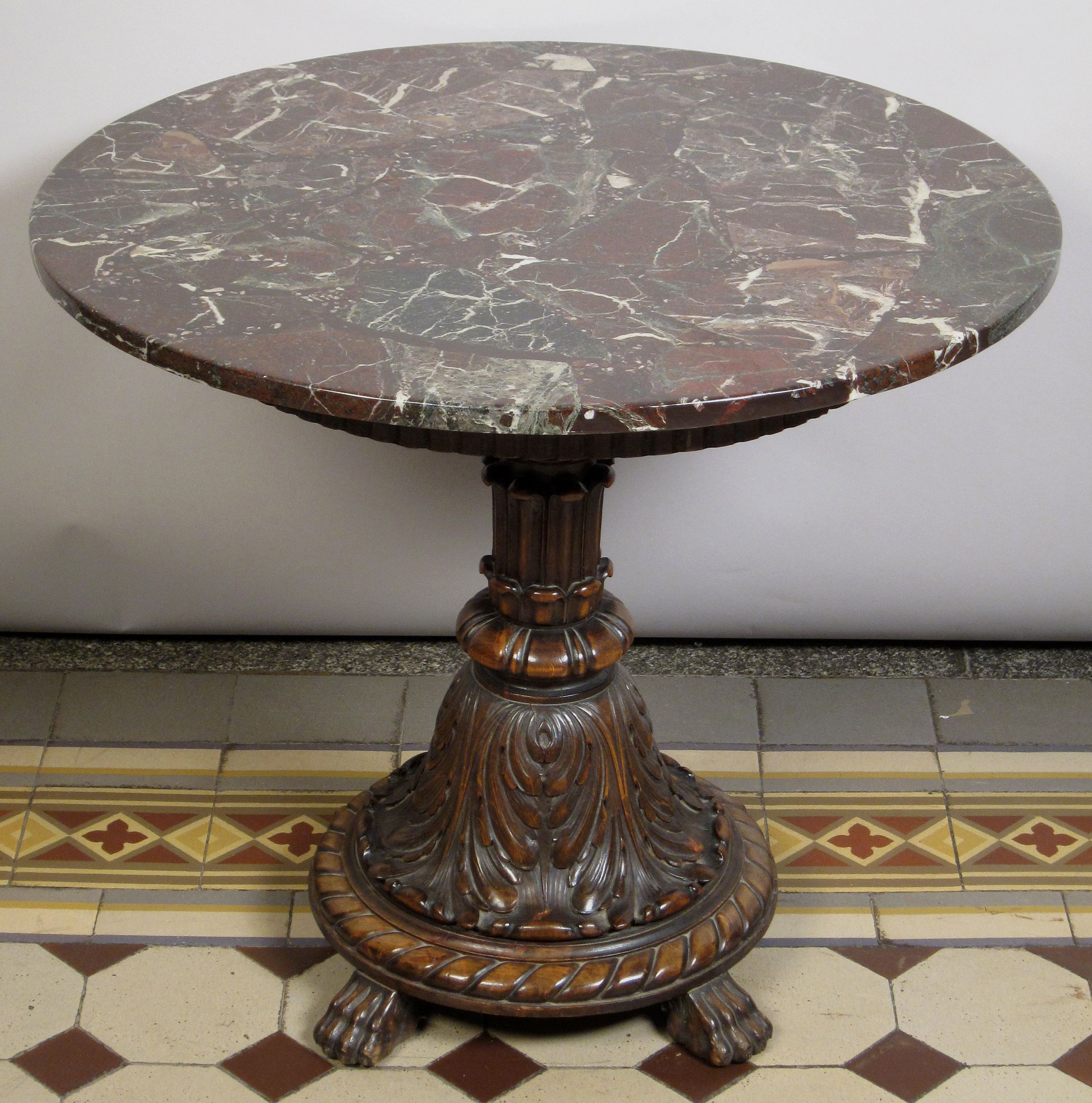 Runder Tisch
 Runder Tisch mit Marmorplatte Epoche Neorenaissance