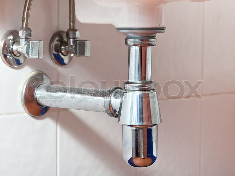 Syphon Waschbecken
 Metall Waschbecken Siphon und Abfluss Stockfoto